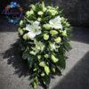 Palma pogrzebowa owalna ze lilią w kolorze biało zielono pistacjowym